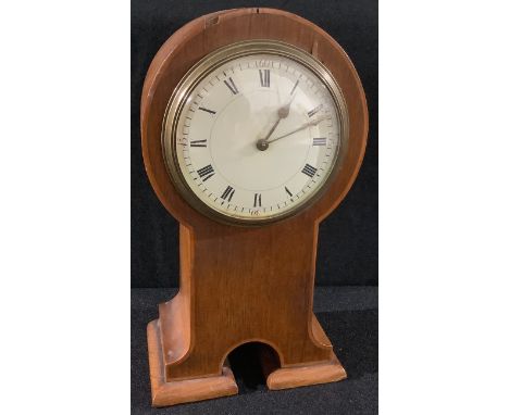 An Arts and Crafts oak mantel clock, 22cm high 