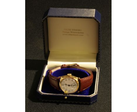 A 1940 Longines cushion 9ct gold watch, retailed by J W Benson, movement signed 8883882, enamelled dial with cathedral handle