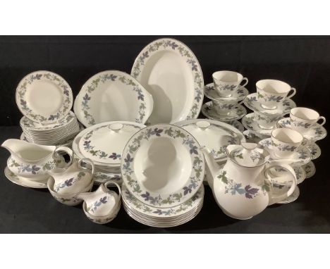 A Royal Doulton Burgandy pattern dinner, tea and coffee service, for six, including tureens, meat plate, sauce boat, coffee p