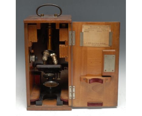An Ernst Leitz lacquered brass and black-enamelled compound monocular microscope, serial no. 104826, with triple nosepiece, a