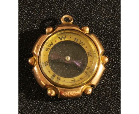 A 9ct rose gold mounted miniature compass fob, 3cm 
