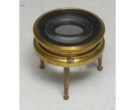 Cartography - a 19th century lacquered brass tripod map reading lens, screw-thread focus adjustment, 4cm high, 4.5cm diam, cy