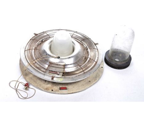 A vintage industrial bulkhead style ceiling lightThe metal chromed light with exterior cage and central bulb together with a 