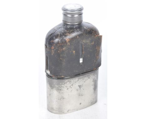 A vintage Yates Crown glass and pewter hip flashOf typical form clad with tan leather exterior and surmounted by a screw top.