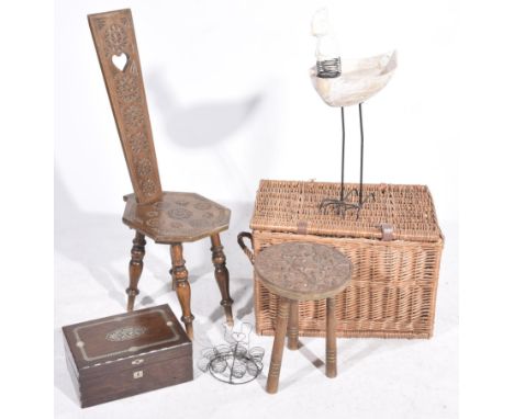 A mixed group of collectablesTo include a wicker lidded log basket, a carved wooden prayer chair, a Victorian Mother of Pearl