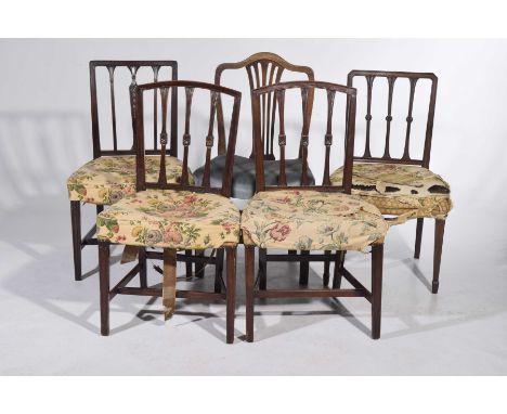 A matched set of four Sheraton style mahogany dining chairs and one otherThe chairs each with three shaped vertical rails abo