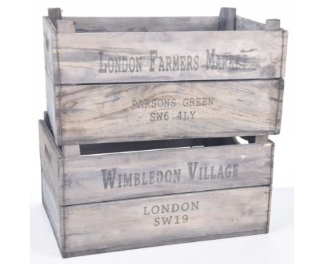 Two vintage apple cratesEach of typical rectangular form with handle apertures to either side, stamped with text Wimbledon vi