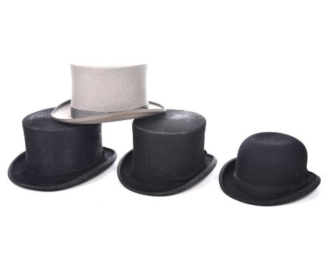 A collection of vintage gentleman's top hats and bowler hatsTo include a Christie's of London example top hat, a grey Dormie 