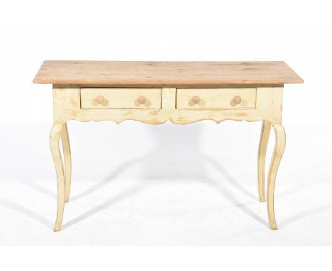 A painted pine Continental style console tableThe rectangular pine top above two painted frieze drawers and a shaped apron, r