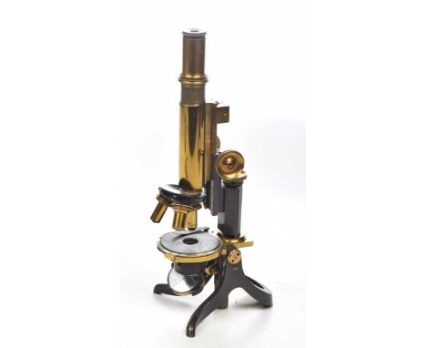 A late 19th/early 20th Century Swift & Sons binocular microscope
The brass and black painted apparatus with three various len