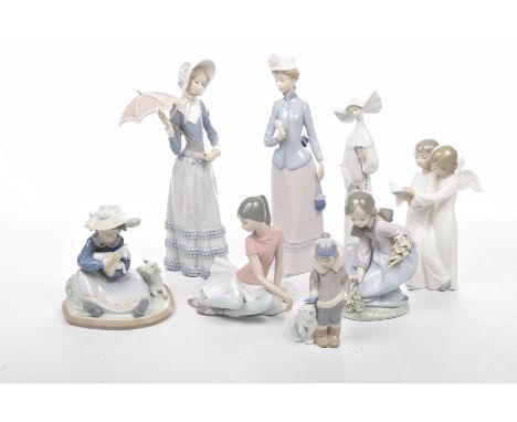 A collection of Lladro and Nao figuresTo include seven Lladro examples depicting ladies in Victorian dress, children picking 