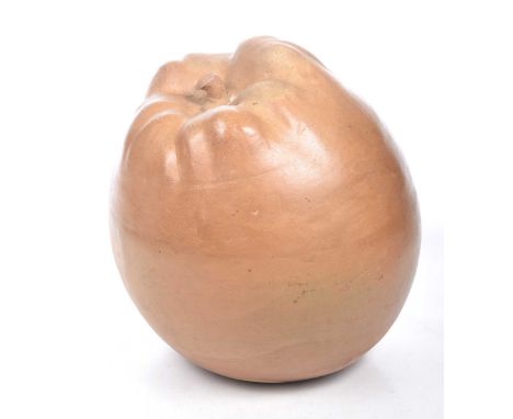 A decorative large oversized terracotta model of an appleOf typical form with all over good glazed patination, 37cm highx32cm
