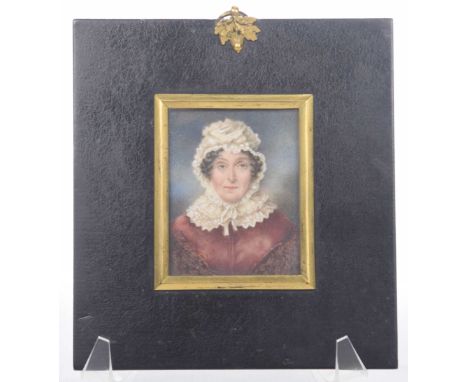 An 18th Century ivory portrait miniature of Elizabeth HillOf square form, the lady dressed in bonnet and red dress, set withi