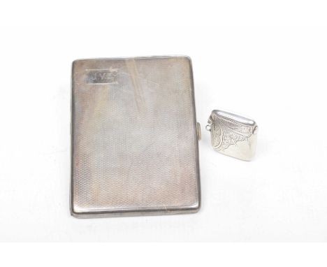 A Silver cigarette case and VestaThe engine turned decorated case, Birmingham, 1928, indistinct markers marks, 11cm x 8.5cm, 