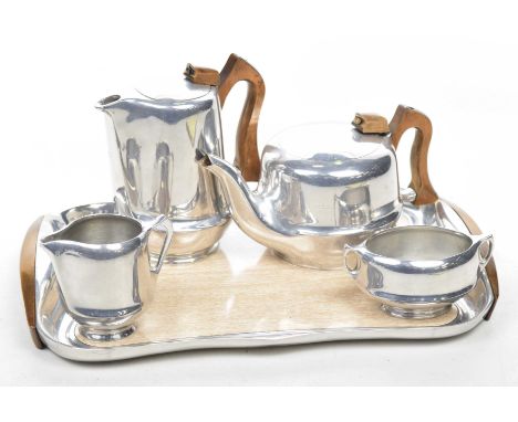 A vintage 1960's Picquot ware four piece tea and coffee serviceThe chromed teapot, coffee pot, milk jug and twin handled suga