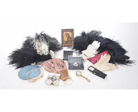 A mixed collection of ladies itemsTo include three pairs of leather gloves, a Mother of Pearl card case, a gilt metal cartogr