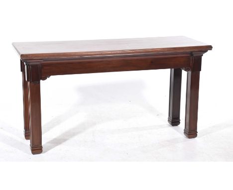 A Victorian mahogany Gothic influence side or console table
The rectangular moulded top above a plain frieze raised on archit