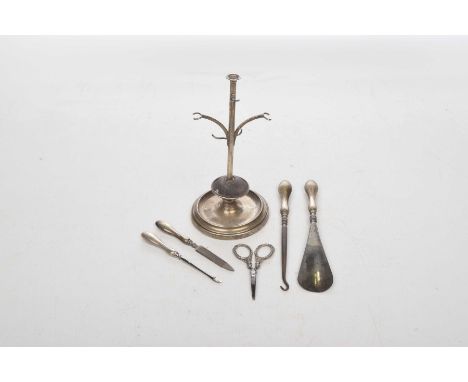 A small collection of ladies Silver dressing items To include a Silver jewellery/hat pin stand, Birmingham, 1938, together wi