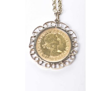 A 1968 mounted sovereign pendantTo a 9k gold belcher-link chain, weight approx. 16.8g 