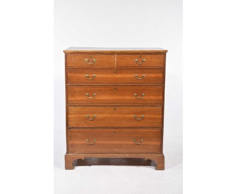 A late 19th Century oak chest of drawers
With an arrangement of two short and four long graduated and cock beaded drawers eac