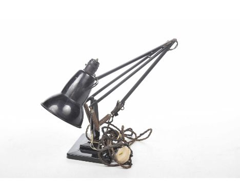 A 1950/60 Anglepoise lampThe black painted lamp with hinged arm, raised on a square stepped base.