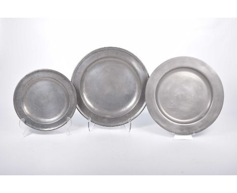A small collection of 18th/19th Century pewterTo include a reeded rim charger with shallow well and ownership initials A.P. t