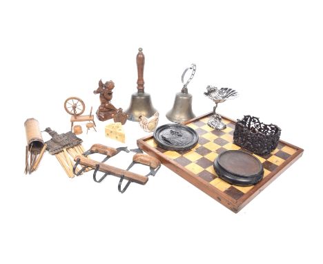 A mixed group of collectable metalware and treen itemsTo include an inlaid chess board, a hand held school bell, a black pain