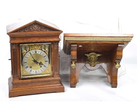 A late 19th Century oak cased bracket clockWith a 7" brass dial with pierced spandrels, silvered chaptering with Arabic and R