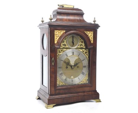 A Georgian mahogany cased bracket clock, Vulliamy, LondonEarly arched 7" brass dial with pierced spandrels and silvered chapt