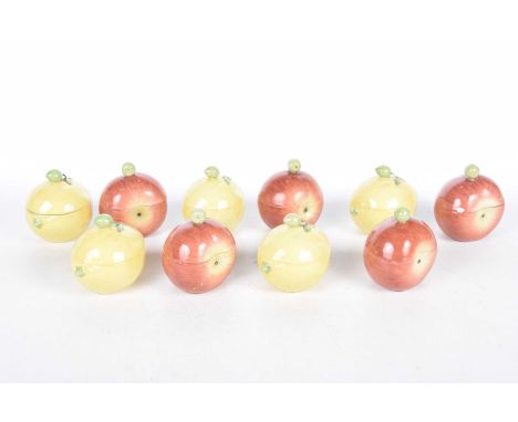A collection of Meissen style condimentsComprising five lemon and five apple examples each with removable cover and fruit fin