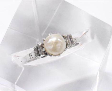 Art Deco platinum cultured pearl and diamond ring, the pearl 7.5mm, with two graduated baguette diamonds to either side, ring