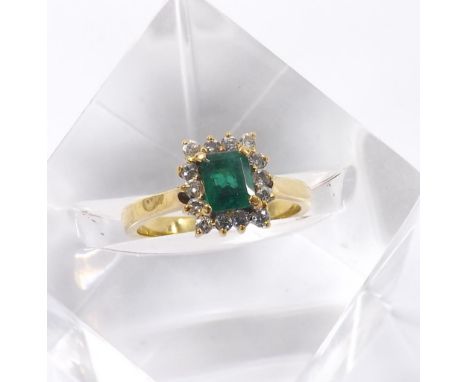 18ct emerald and diamond rectangular cluster ring, the emerald 0.60ct approx in a surround of round brilinat-cut diamonds, cl