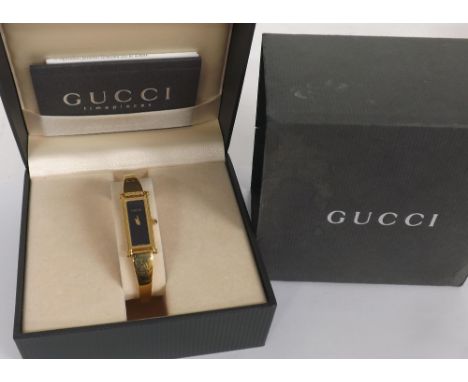 Gucci 1500l gold plated lady's bangle watch, quartz, 14mm - **with original box and related papers - Condition Report: - Move