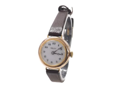 Rolex 9ct lady's wristwatch, import hallmarks for London 1923, signed white dial with Arabic numerals and moon hands, signed 