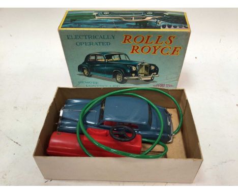 Three battery operated tin plate models including Four Engine Skycruiser and Helicopter both by Marx, Japanese Magic Action B