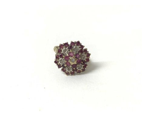 9ct gold ruby and diamond flower head cluster ring, size NWeight 3.8 grams