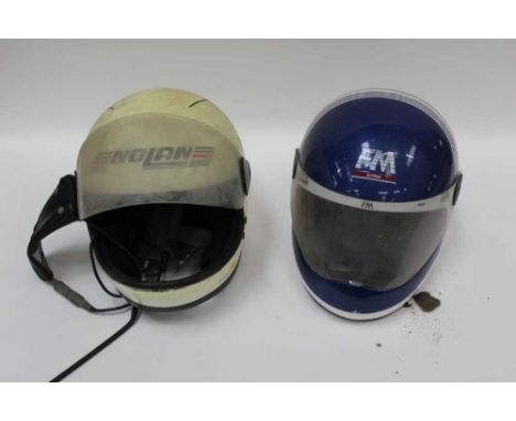 Two vintage motorcycle helmets, together with motorcycle gloves, Honda ties, and other related clothes and accessories (1 box