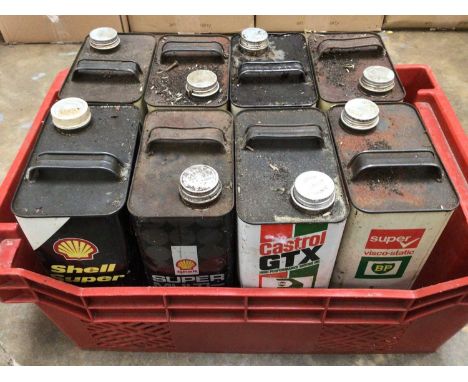 Eight vintage BP, Castrol and Shell oil cans