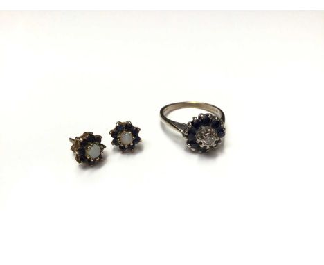 18ct white gold sapphire and diamond flower head cluster ring, size M and pair 9ct gold sapphire and opal cluster earrings18c