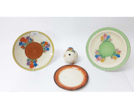 Three Clarice Cliff plates, together with a Celtic Harvest preserve pot (4)