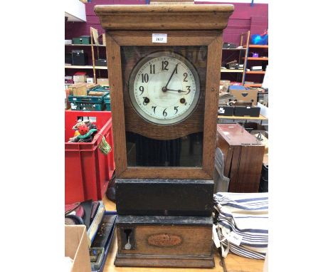 Oak cased clocking in clock by the International Time Recording Co LtdDoor appears to be seized, key is present as is winding