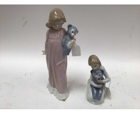 Three Lladro porcelain clowns together with two Nao porcelain figures of girls with Teddy bears (5)