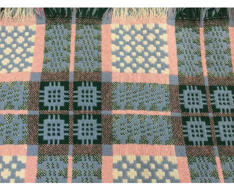Vintage welsh woven wool blanket in pink and blue. 170 x 240 cms approximatelyVery good condition.