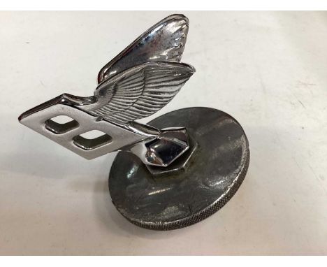 Bentley Flying B Mascot from a MKVI or R Type, together with a chromium plated mascot of a winged nymph and a car clock (3)Be