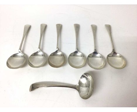 Six George V Old English pattern soup spoons, together with a matching ladle (Sheffield 1932), all 15ozs
