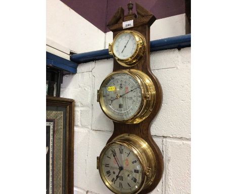 Sewills combination hygrometer, barometer and clock mounted on wooden baseCondition is good, we can't be certain whether the 