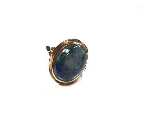 Opal doublet cocktail ring on yellow metal shank, size J½Shank is not marked. Weight 4.2 grams 