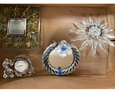 Swarovski crystal Solaris table clock together with a Kris bear table clock and two photograph frames, both frames are boxed 