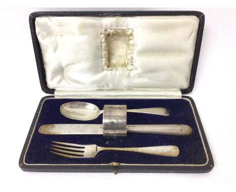 Silver christening set comprising knife, fork, spoon and napkin ring set in fitted caseHallmarks date from 1927 - 1929, Londo