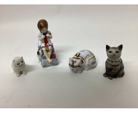 Royal Worcester figure of Saturday's Child, together with a Beswick cat and two other cat figures (4)